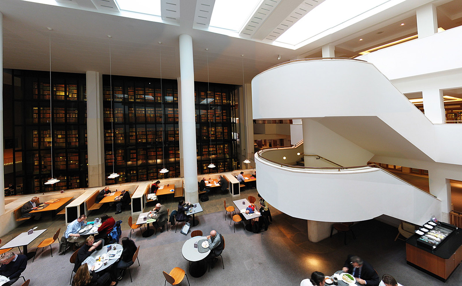 interior of the British Library with the smoked glass wall of the King's Library in the background