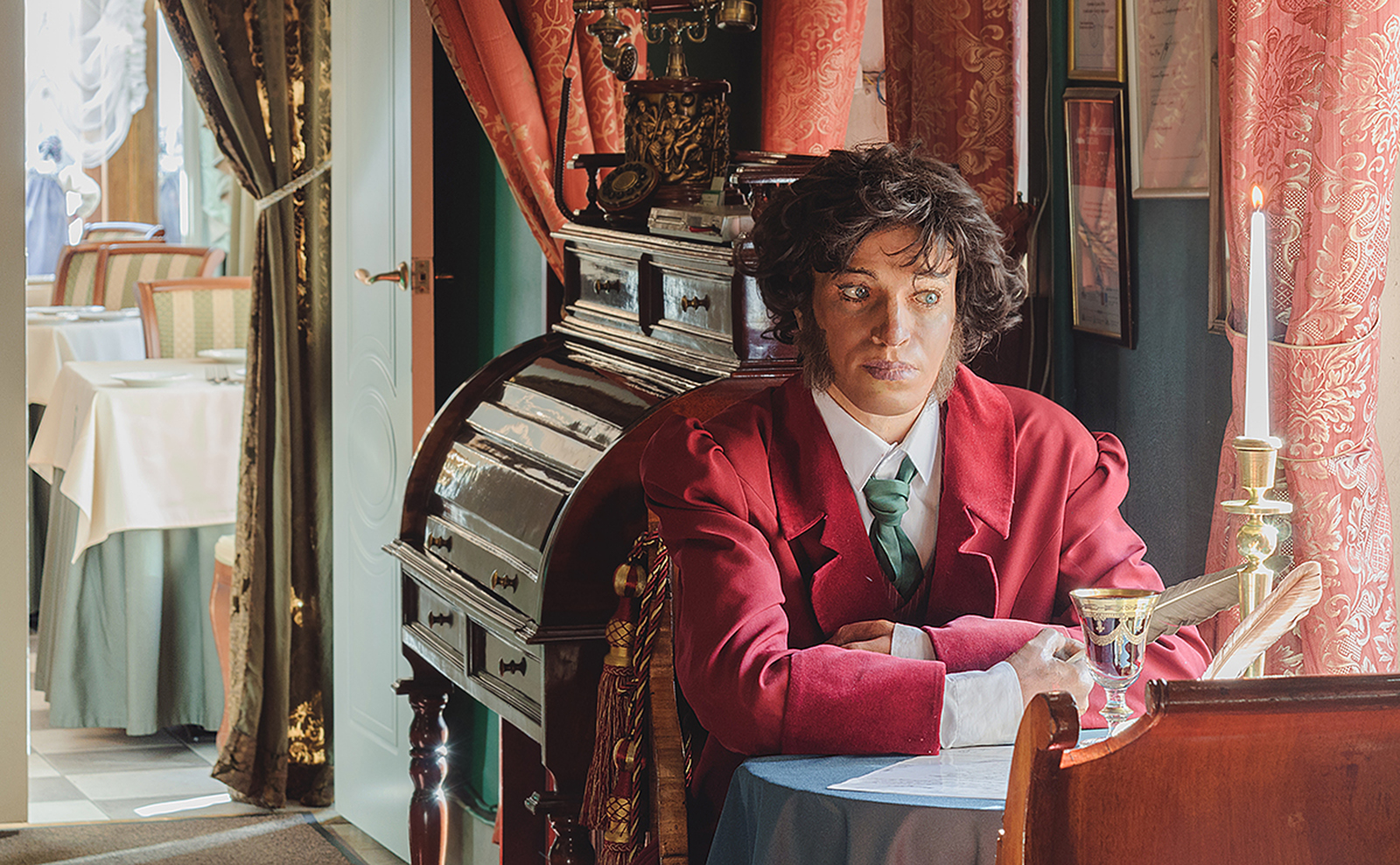 wax model of pushkin at the literary cafe in st. petersburg